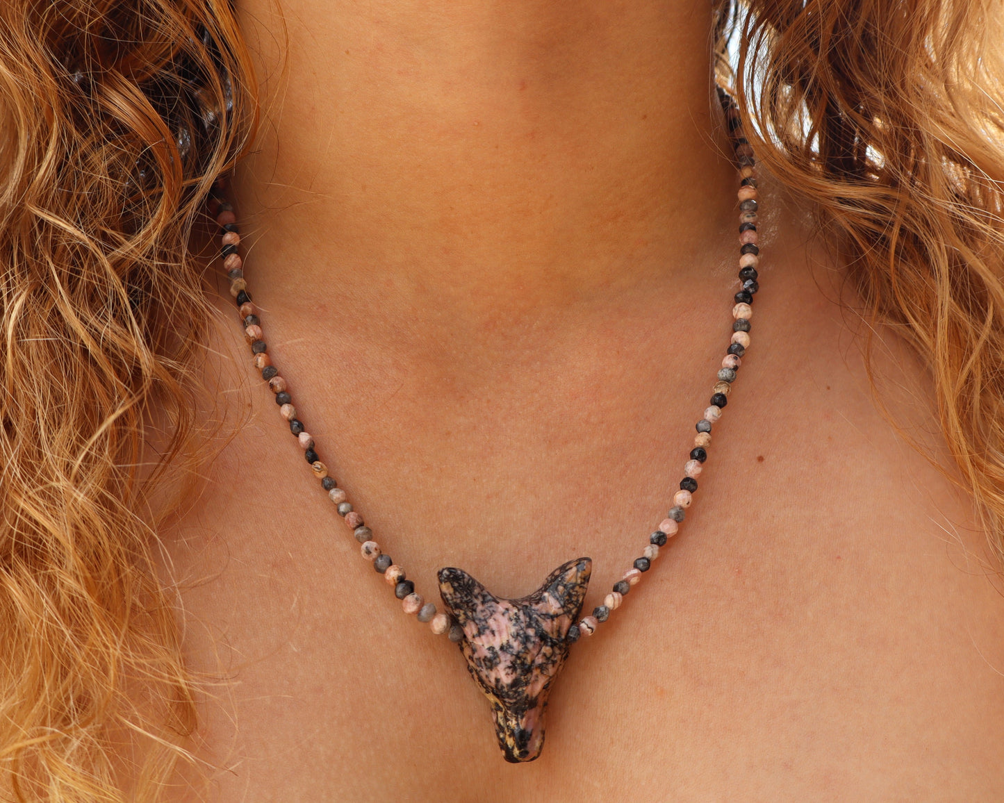 Luperis in Rhodonite