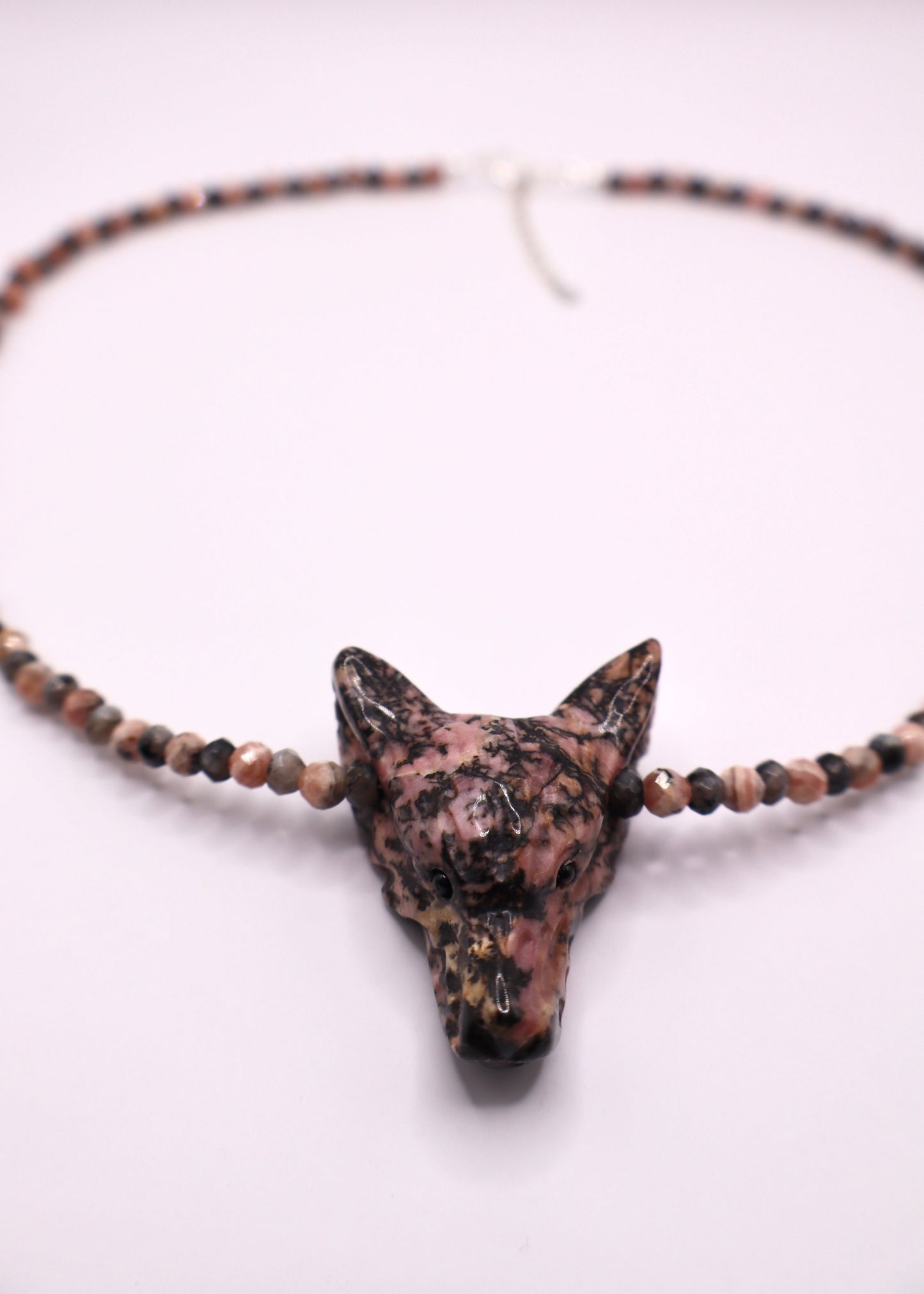 Luperis in Rhodonite